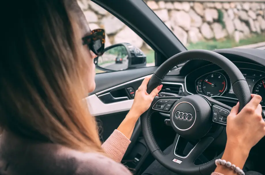 Interior view of woman driving car