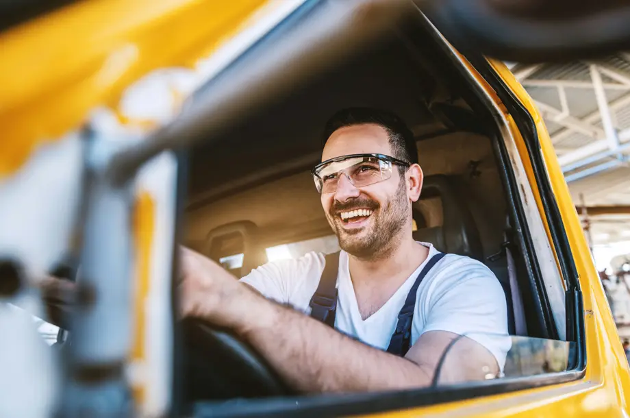 Man driving work vehicle